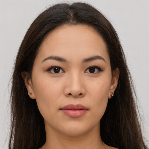 Neutral asian young-adult female with long  brown hair and brown eyes