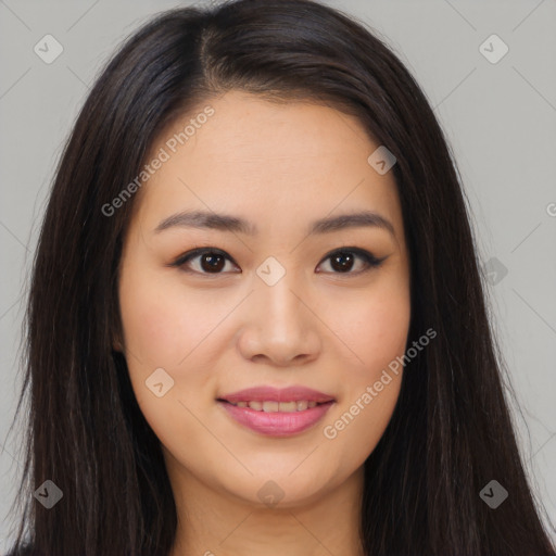 Joyful asian young-adult female with long  brown hair and brown eyes