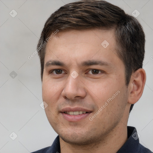 Joyful white young-adult male with short  brown hair and brown eyes