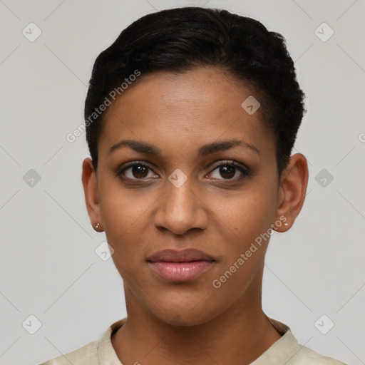 Joyful black young-adult female with short  brown hair and brown eyes