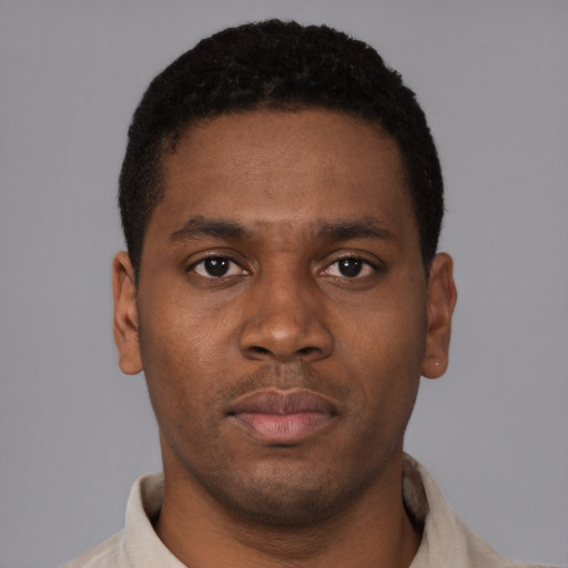 Neutral latino young-adult male with short  brown hair and brown eyes