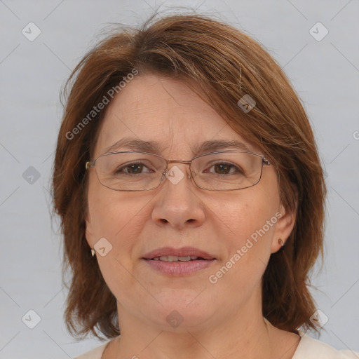 Joyful white adult female with medium  brown hair and brown eyes