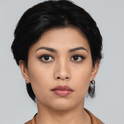 Neutral asian young-adult female with medium  black hair and brown eyes