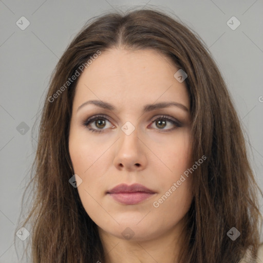 Neutral white young-adult female with long  brown hair and brown eyes