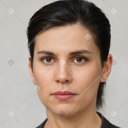 Neutral white young-adult female with short  brown hair and brown eyes