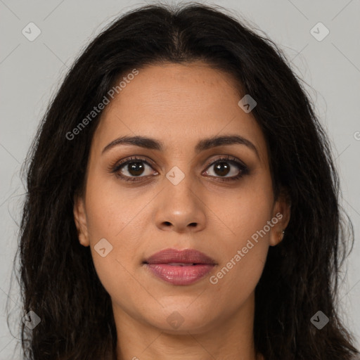 Joyful latino young-adult female with long  brown hair and brown eyes