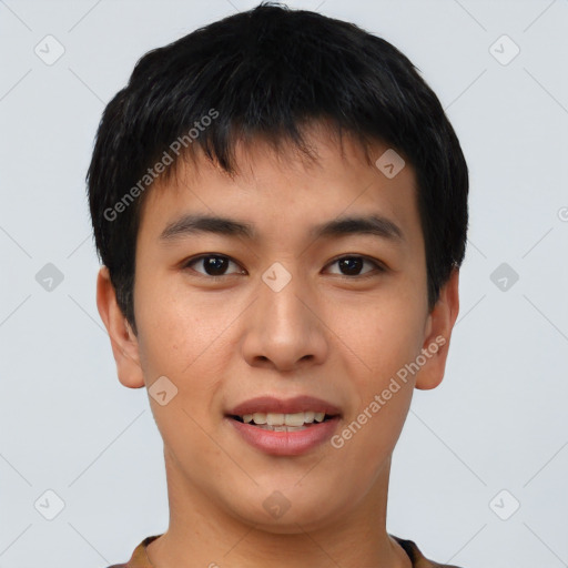 Joyful asian young-adult male with short  black hair and brown eyes