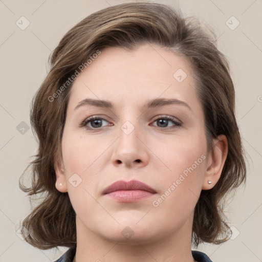 Neutral white young-adult female with medium  brown hair and grey eyes