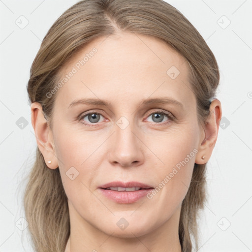 Joyful white young-adult female with long  brown hair and grey eyes