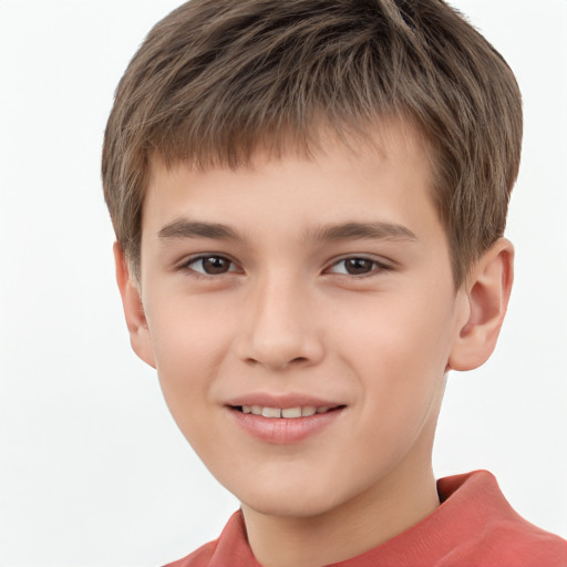 Joyful white child male with short  brown hair and brown eyes