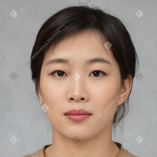 Neutral asian young-adult female with medium  brown hair and brown eyes