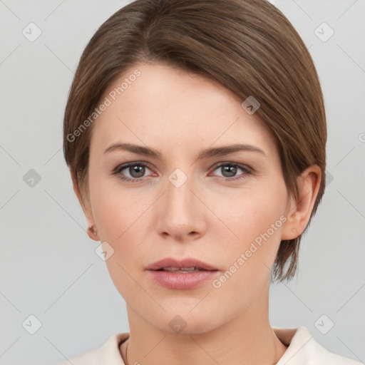 Neutral white young-adult female with short  brown hair and brown eyes