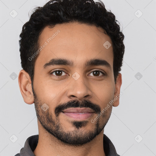 Joyful latino young-adult male with short  brown hair and brown eyes