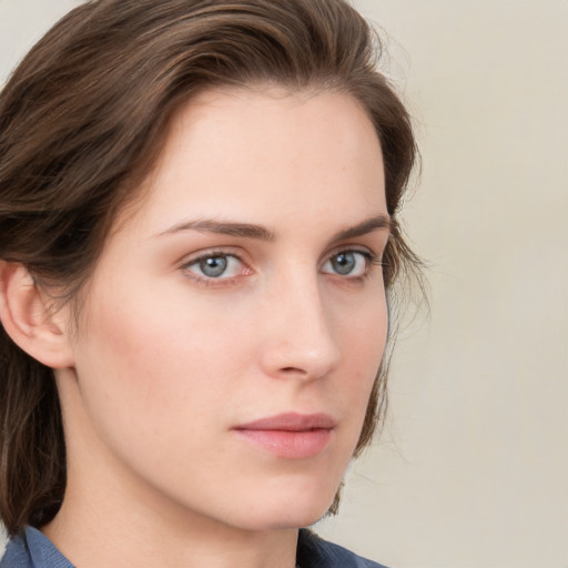 Neutral white young-adult female with medium  brown hair and grey eyes