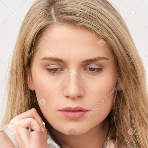 Neutral white young-adult female with long  brown hair and brown eyes