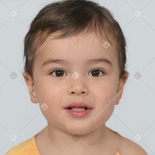 Joyful white child male with short  brown hair and brown eyes