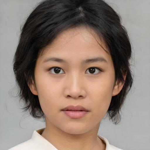 Neutral asian young-adult female with medium  brown hair and brown eyes