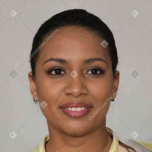 Joyful black young-adult female with short  brown hair and brown eyes