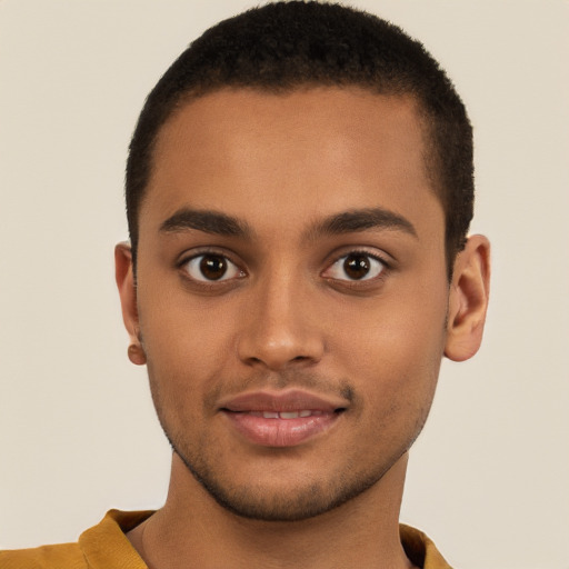 Joyful latino young-adult male with short  brown hair and brown eyes