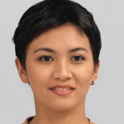 Joyful asian young-adult female with short  brown hair and brown eyes