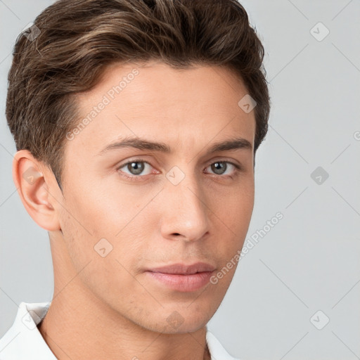 Neutral white young-adult male with short  brown hair and brown eyes