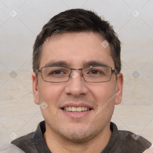 Joyful white adult male with short  brown hair and brown eyes