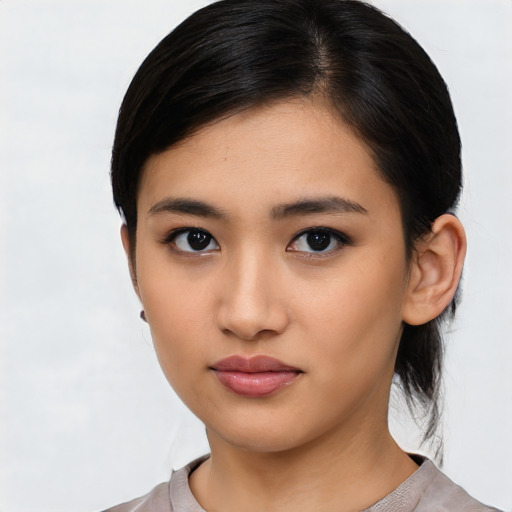 Neutral asian young-adult female with medium  black hair and brown eyes