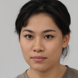 Neutral asian young-adult female with medium  brown hair and brown eyes