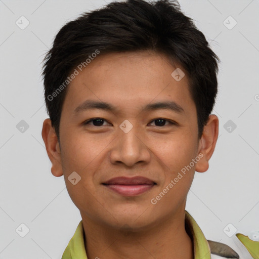 Joyful asian young-adult male with short  brown hair and brown eyes