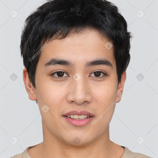 Joyful asian young-adult male with short  black hair and brown eyes