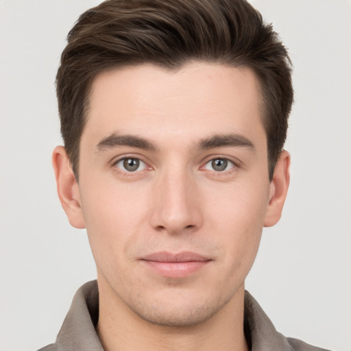 Neutral white young-adult male with short  brown hair and brown eyes