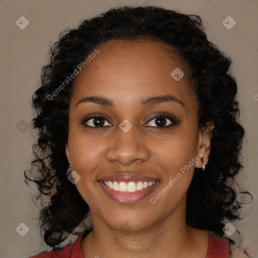 Joyful black young-adult female with medium  black hair and brown eyes