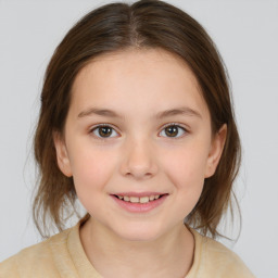 Joyful white child female with medium  brown hair and brown eyes