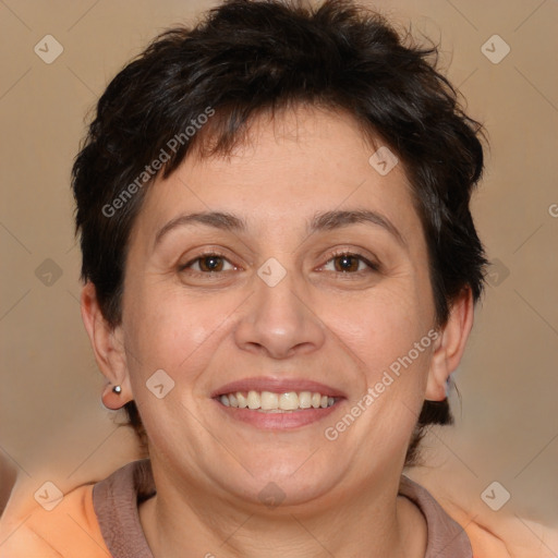 Joyful white adult female with short  brown hair and brown eyes