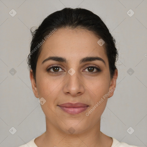 Joyful latino young-adult female with short  brown hair and brown eyes