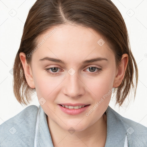 Joyful white young-adult female with medium  brown hair and blue eyes