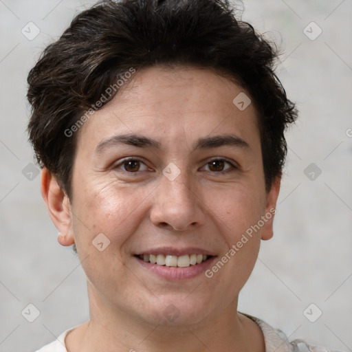 Joyful white adult female with short  brown hair and brown eyes