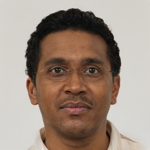 Neutral black adult male with short  brown hair and brown eyes