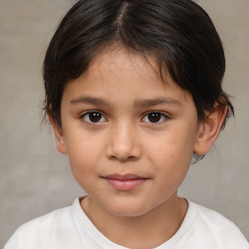 Joyful white child female with medium  brown hair and brown eyes