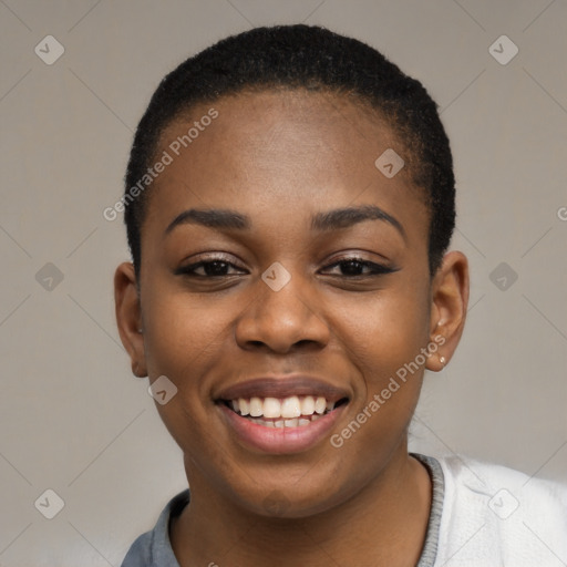 Joyful black young-adult female with short  black hair and brown eyes