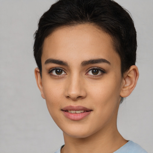 Joyful white young-adult female with short  brown hair and brown eyes