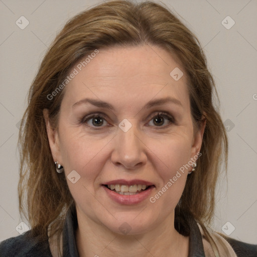 Joyful white adult female with medium  brown hair and brown eyes