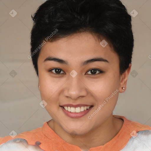 Joyful asian young-adult female with short  brown hair and brown eyes