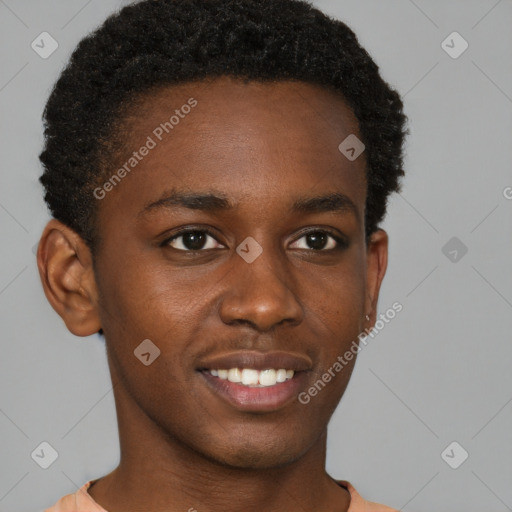 Joyful black young-adult male with short  brown hair and brown eyes