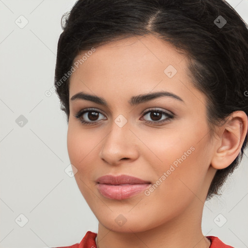 Joyful latino young-adult female with long  brown hair and brown eyes