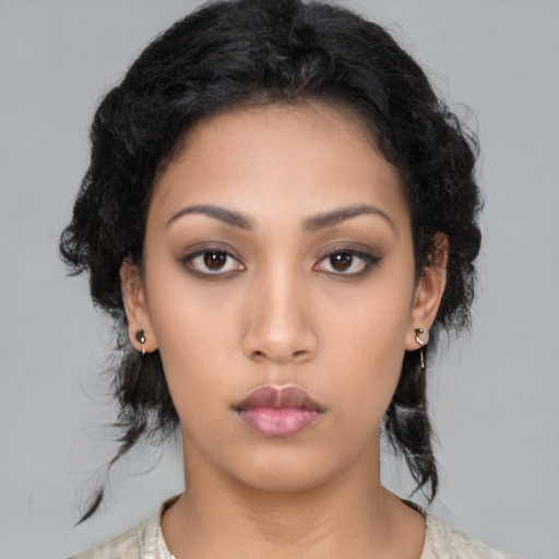 Neutral latino young-adult female with medium  black hair and brown eyes