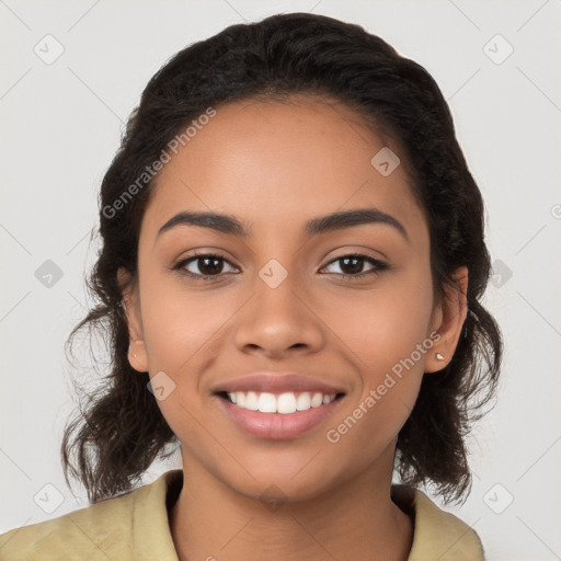 Joyful latino young-adult female with long  brown hair and brown eyes