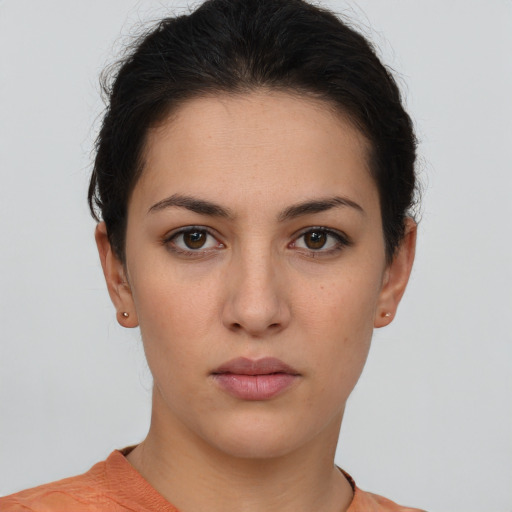 Neutral white young-adult female with short  brown hair and brown eyes