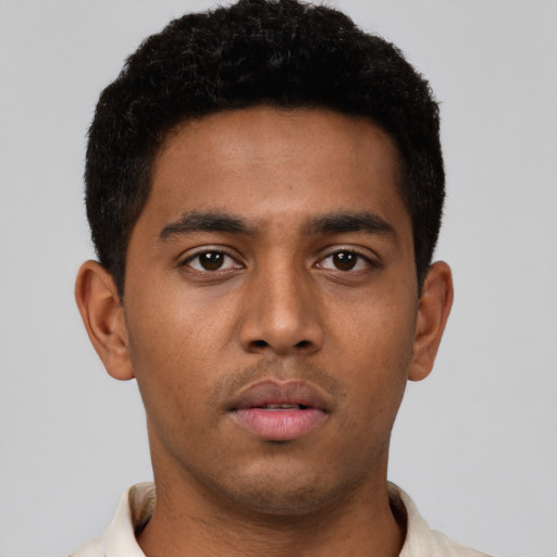 Neutral latino young-adult male with short  brown hair and brown eyes