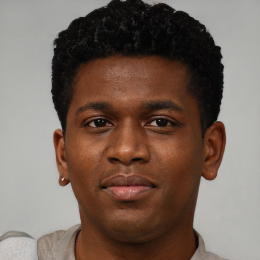 Neutral black young-adult male with short  brown hair and brown eyes